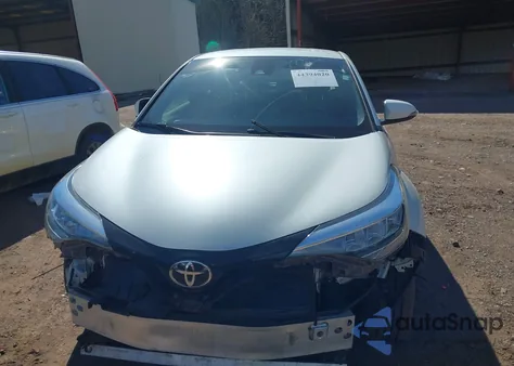 2021 Toyota C-Hr Xle z USA, uszkodzony, nr VIN JTNKHMBX9M1100306